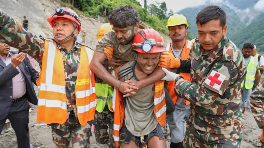 Nepal survivor chant Hare Krishna