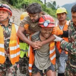 Nepal survivor chant Hare Krishna